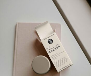Premium Cosmetic Box Packaging Mockup PSD featuring skincare box and jar for beauty product branding