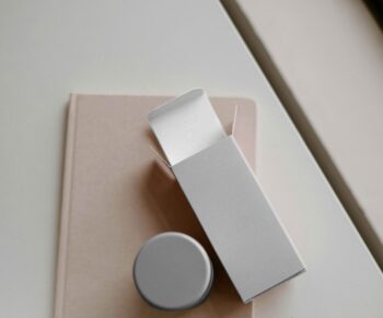 Premium Cosmetic Box Packaging Mockup PSD featuring skincare box and jar for beauty product branding. skincare box mockup.